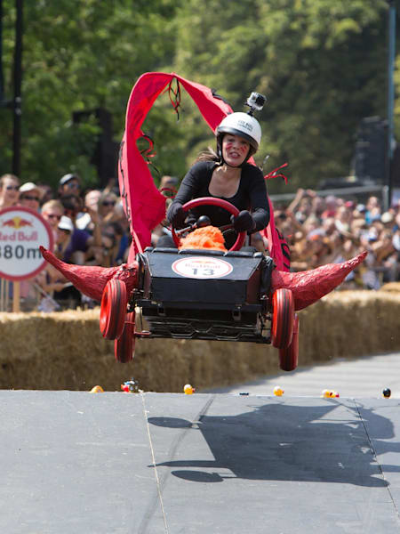 A member of the Dare Devils soapbox race team clears a jump