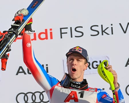 Clément Noël celebrates triumphantly with Red Bull skis at the FIS Alpine Skiing World Cup event in Gurgl, Austria during the 2024-2025 season.