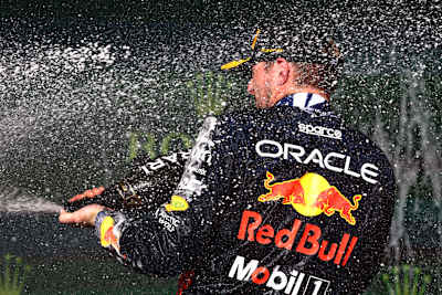 SAO PAULO, BRAZIL - Race winner Max Verstappen of the Netherlands and Oracle Red Bull Racing celebrates on the podium during the F1 Grand Prix Sao Paulo, Brazil. (Photo by Mark Thompson/Getty Images)