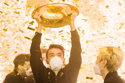 Team Spirit players celebrate their victory in the Dota 2 The International 10 tournament.