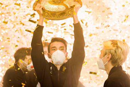 Team Spirit players celebrate their victory in the Dota 2 The International 10 tournament.