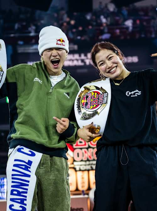 Issin and Riko present their championship belts after winning Red Bull BC One World Final 2025 on November 9, in Tokyo, Japan.