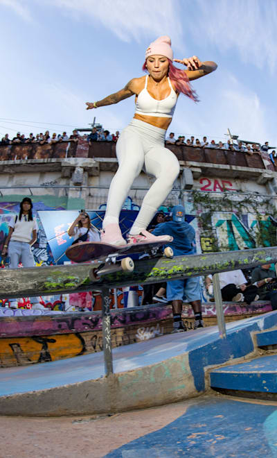 Brazil's Leticia Bufoni locks into a Monty Grind  to the approval of the skaters assembled for the Marseille stop of the Red Bull Drop In Tour