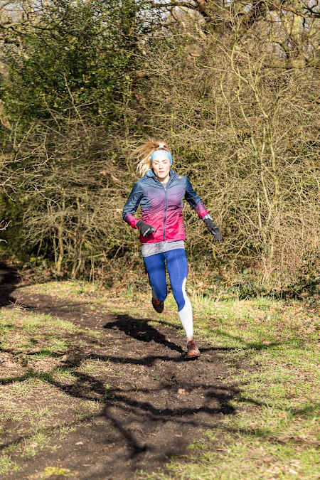 Lucy Charles-Barclay runs a park trail near her home in London.