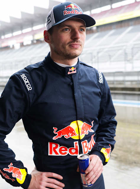 Max Verstappen standing next to the Nissan Z NISMO GT500 at Fuji Speedway in May, 2026.