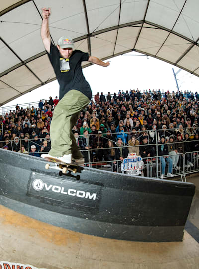 The stone Jersey barrier set into the funbox at Mystic skatepark feels the lock of Jamie Foy's Backside Tailslide during the Prague demo