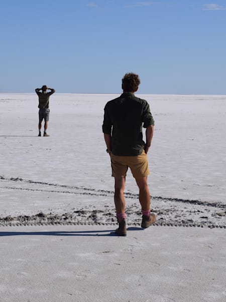 Turner twins look out across Lake Eyre in Australia.