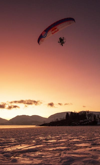 Horacio Llorens performs during the Aurora Borealis in Tromsø, Norway on January 12, 2016
