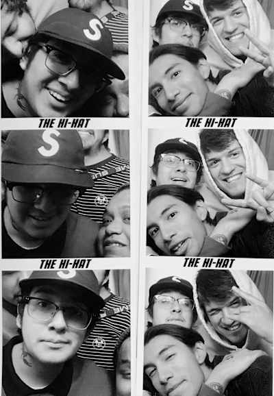 Cuco and a few of his friends smush into the photo booth at the Hi Hat.
