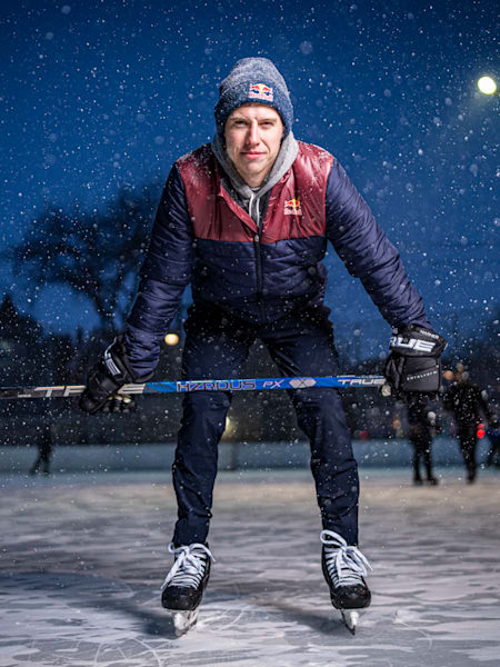 Mitch Marner on an outdoor rink at night while it snows