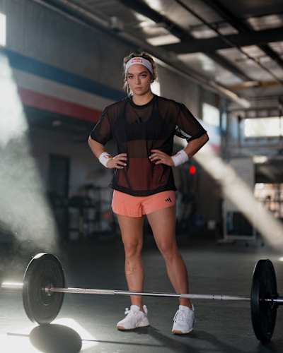 Functional fitnees athlete Haley Adams of the USA poses with a set of weights in her gym in Nashville, Tennessee.