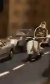 Max Verstappen, al lavoro in scooter