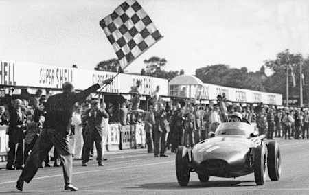 Stirling Moss, driving for Vanwall, won the British Grand Prix in 1957. 