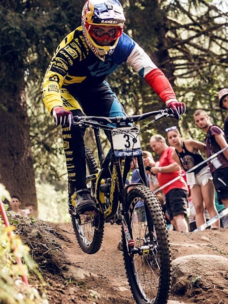 Loïc Bruni racing at the Val di Sole UCI DH Mountain Bike World Cup in Italy on August 22, 2015