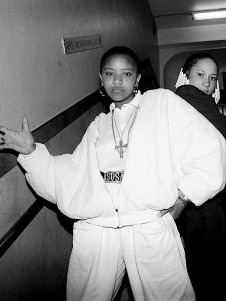 Cookie Crew pose on a staircase, UK, 1980s
