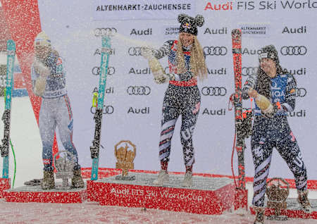 L-R: Kajsa Vickhoff Lie, Lindsey Vonn and Jacqueline Wiles spray champagne on the podium at the FIS Apline Skiing World Cup on January 10, 2026 on Zauchensee, Austria.