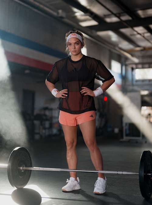 Functional fitnees athlete Haley Adams of the USA poses with a set of weights in her gym in Nashville, Tennessee.