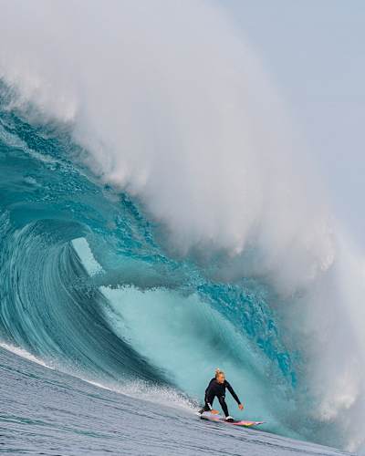 Izzi Gomez surfs a huge wave at Cortes Bank, California