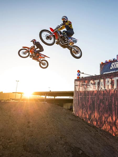 Ronnie Mac and Ryan Morias launch off the start structure at Red Bull Straight Rhythm.