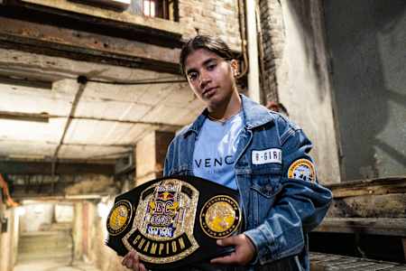 India posing with the belt from the Red Bull BC One World Final 2022 on November 12, 2022. 