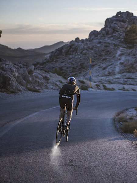 A photo of cyclist Patrick Seabase riding his bike.