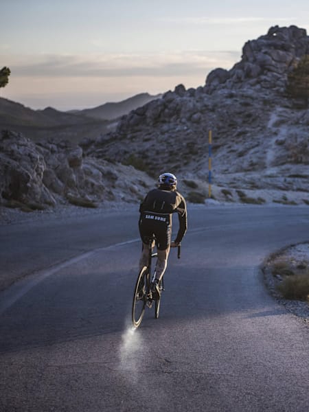 A photo of cyclist Patrick Seabase riding his bike.