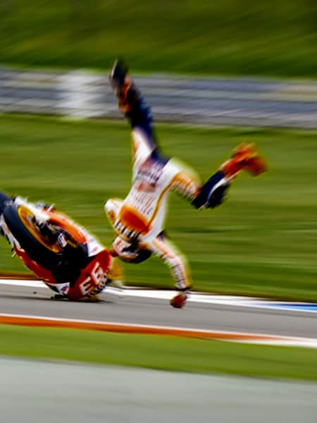How do riders survive a MotoGP crash