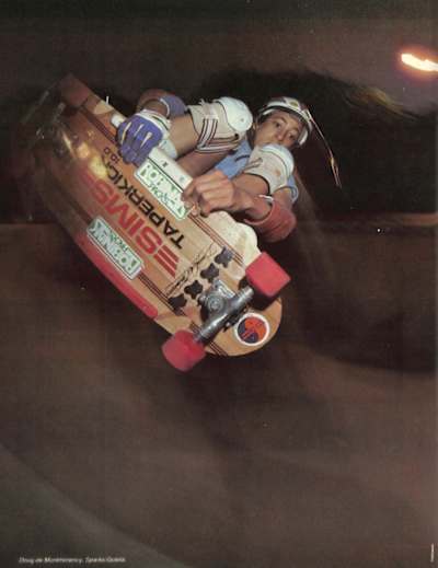 Doug De Monmorency holds onto his frontside rail with both hands for the pages of Skateboarder Magazine.