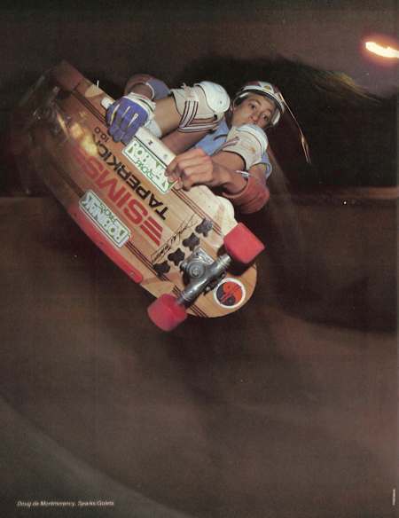 Doug De Monmorency holds onto his frontside rail with both hands for the pages of Skateboarder Magazine.