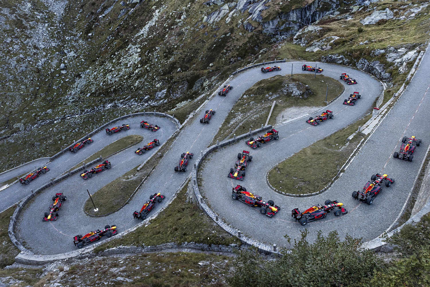 Buemi drives a Formula 1 car through the Swiss Alps