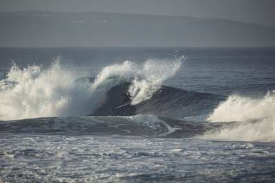 In 2024, Natxo Gonzalez carves powerfully at Nazaré, Portugal.