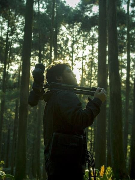 Japanese recording artist and RBMA graduate Yosi Horikawa looking for new field recordings on the island of Yakushima, Japan, in his new film Layered Memories