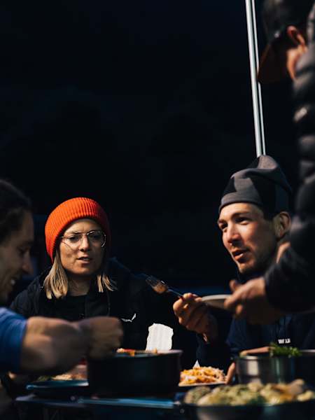 Tommy Friedrich enjoying dinner at Disentis during Red Bull X-Alps 2025
