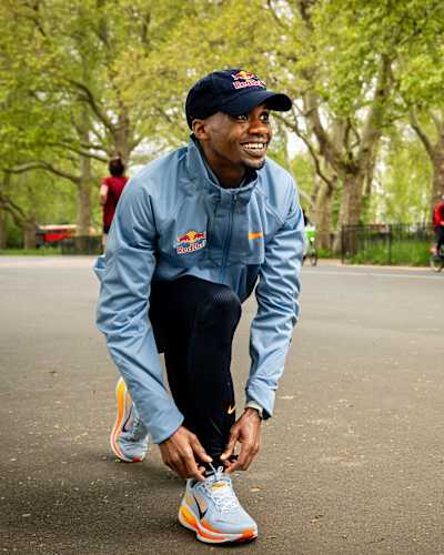 Jacob Kiplimo laces up for his training session in Hyde Park London