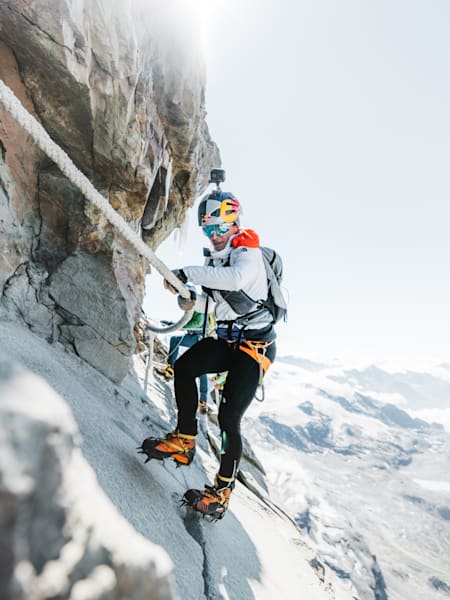 Photo of Ultra Runner Fernanda Maciel climbing in the Alps.