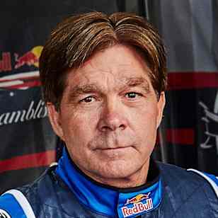 Kirby Chambliss poses with his race plane ahead of the Red Bull Air Race World Championship in Spielberg, Austria on April 23, 2016