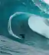 Mick Corbett drawing lines on a mutant wave
