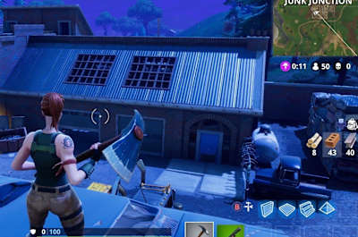 Check on top of the piles of cars for loot