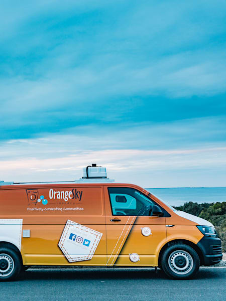 Orange Sky provides a place for people to wash and to talk