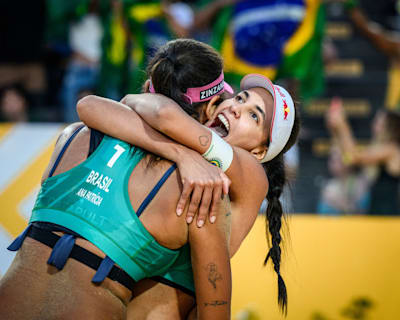 Duda and Ana Patrícia hug after winning the FIVB Beach Volleyball World Championsgips in Rome, Italy on June 19, 2022.
