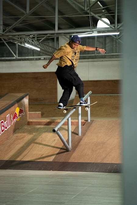 In Cebu, Philippines, April 2021, Margielyn Didal executes a flawless frontside boardslide on a skatepark rail.