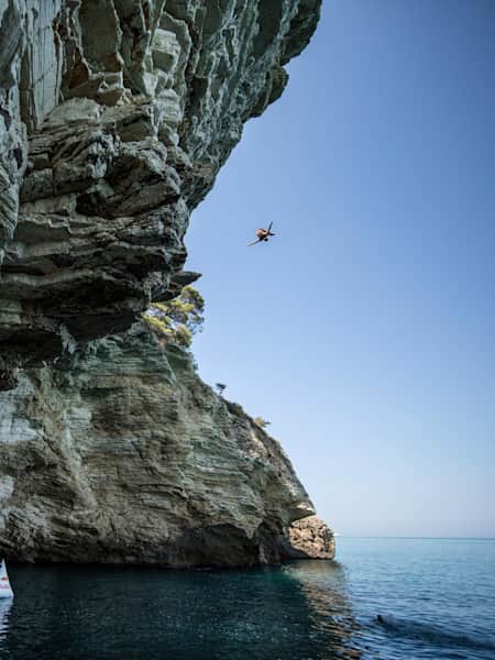 Alessandro De Rose of Italy dives 23 metres at Grotta dei Pipistrelli (Cave of Bats) in build up to the third stop of the Red Bull Cliff Diving World Series, at Gargano, Italy on July 20, 2017.