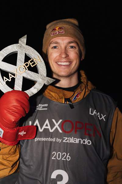 Scotty James proudly holds his Snowboard Halfpipe trophy at the Laax Open 2026 in Laax, Switzerland.