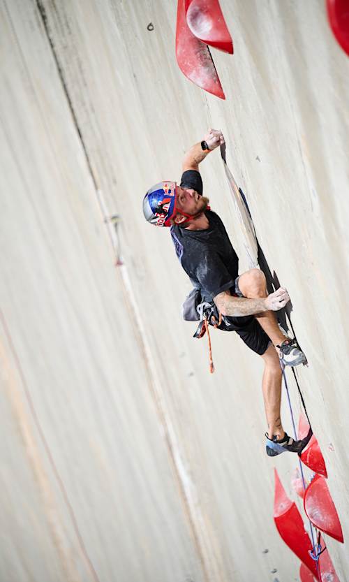 Felipe Camargo of Brazil climbs the 180m multi-pitch man made route at the Verzasca Dam during the qualification round of Red Bull Dual Ascent in Verzasca, Switzerland on October 30, 2024.