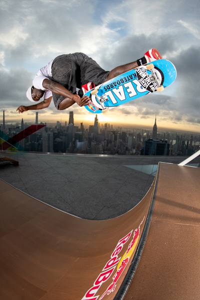 Zion Wright showcases his bold skateboarding skills on The Edge in New York City on September 23, 2024, with the iconic skyline as a dramatic backdrop