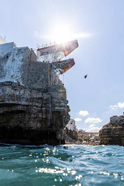 On 27 September 2026, Romania’s Constantin Popovici launches from the 27-metre platform during the Red Bull Cliff Diving World Series final in Polignano a Mare, Italy