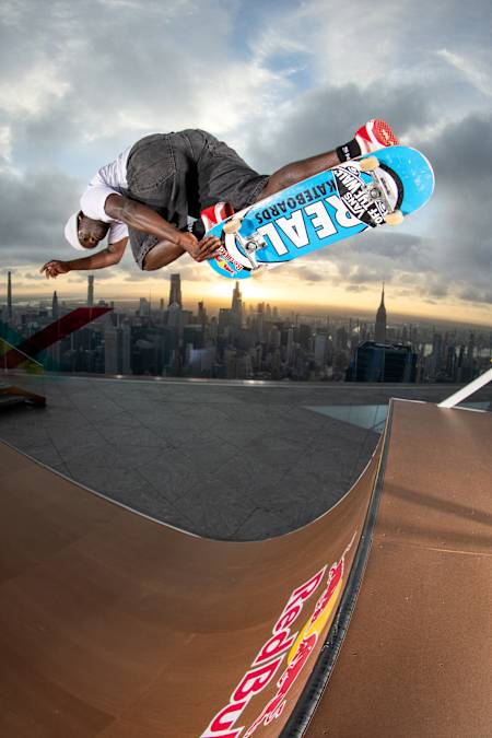 Zion Wright showcases his bold skateboarding skills on The Edge in New York City on September 23, 2024, with the iconic skyline as a dramatic backdrop