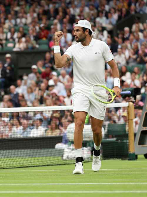 Matteo Berrettini of Italy celebrates as he plays against Jannik Sinner of Italy in his Men's Singles second round match during day three of Wimbledon 2024.