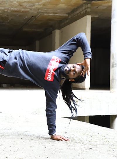 Indian hip-hop dancer Velu Kumar poses for a photo while dancing.