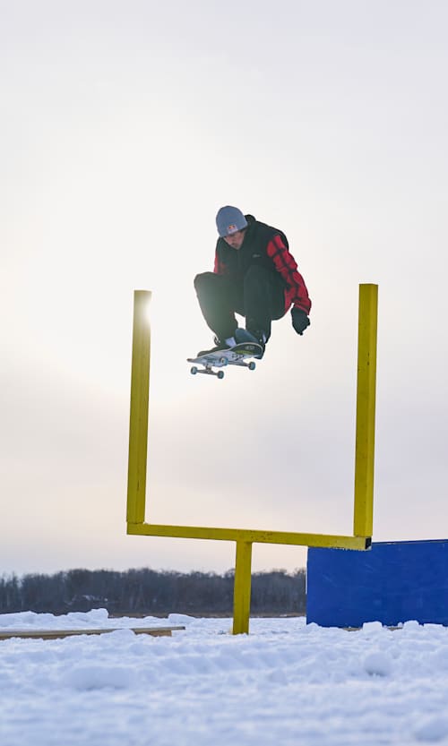 Ryan Decenzo Frontside Kickflips during Red Bull Project Carousel on Coon Lake, East Bethel, Minnesota, USA on February 10, 2025.